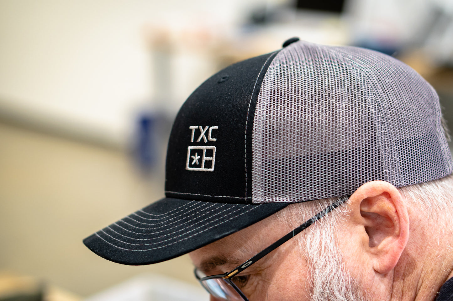 
                  
                    TXC Trucker Hat
                  
                